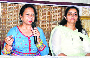 Dr Ranjana Sharma from Swayamsiddha, an NGO, addresses a press conference in Karnal on Thursday
