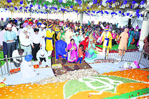 Devotees pay obeisance at Gurdwara Dera Kar Sewa on the occasion of Gurpurb in Karnal on Thursday. The festival was celebrated with religious and traditional fervour in many parts of the state, with a large number of people thronging gurdwaras since early morning.