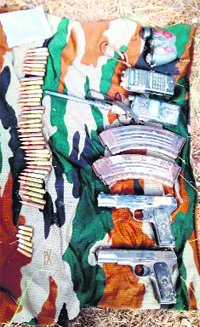 The arms seized from a hideout in Chaurangal forest of Ramban district on Thursday.