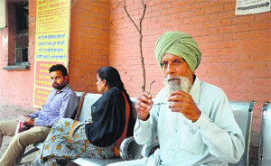 People wait at the Civil Surgeons office to get the birth and death certificates.