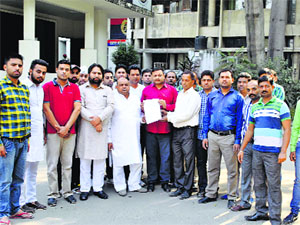 Youth Congress workers outside the Police Commissioners office in Ludhiana.