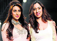 With karisma kapoor (L)