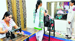 Women jail inmates undergo training in tailoring and make-up in Patiala Central Jail. 