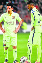 Barcelonas Lionel Messi (L) and Neymar await to take a free kick during the UEFA Champions League football match between Ajax Amsterdam and FC Barcelona in Amsterdam. AFP