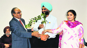 Organisers honour the guest at the recently concluded eco-film festival at GNDU in Amritsar.