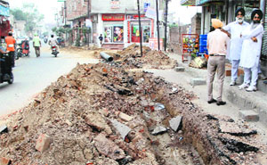 The Ajit Road that has been dug up for the laying of water pipes in Bathinda on Friday.