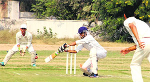 A batsman plays a shot during the Punjab State Cricket Tournament at Punjab Police Public School in Bathinda on Friday. 