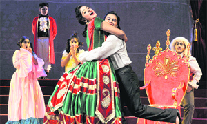 Students enact a scene from the play, The Phantom of the Opera, in Chandigarh on Friday. 