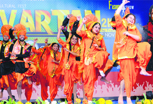 Participants perform during the 9th State-Level Techno-Cultural Symposium, Parivartan-2K14 in Landran on Friday.