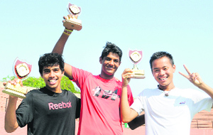 (From left): Aditya Vashisht, Kabir Manrai and Calvin Golmei in a jubulant mood with their trophies on Friday.