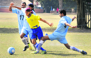 Players in action during a match of the Inter-College Football Tournament on the PU campus.