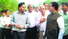Finance Minister Capt Abhimanyu (right) at the Herbal Park in Jind city on Friday. Tribune photo