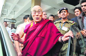 Tibetan spiritual leader the Dalai Lama arrives at the Kangra airport after his two-nation teaching tour of Canada and the US on Friday. 