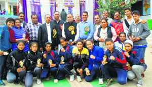 Winners of the cultural tournament with Excise and Taxation Minister Prakash Choudhary on the concluding day of the event at Rajgarh in Mandi on Friday