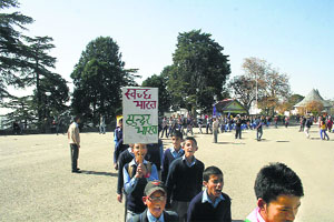 Schoolchildren hold an awareness rally on the flag-raising day of Scouts and Guides in Shimla on Friday