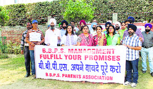 Parents protest outside Bal Bharti Public School in Ludhiana on Friday