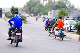 The four-lane road without traffic lights at the Loharka bypass near Gumtala crossing  in Amritsar on Saturday