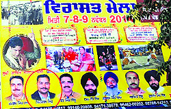 A photo of the accused ( in circle) who was booked in a molestation case adorns a poster welcoming visitors to the Virasat Mela in Bathinda