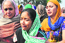 Inconsolable mother Harinder Kaur at the cremation ground