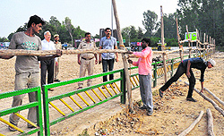 Wooden barricades have been set up to prevent the supporters of Sant Rampal from entering the railway station in Chandigarh