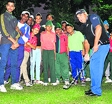 Arjuna Award winner and Director of Academy of Golf, Chandigarh Golf Club, Harmeet Kahlon inaugurates the 5th Pitch N Putt Day N Night golf match on Saturday at Sector 44, Chandigarh