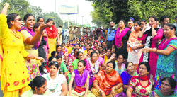 Members of the EGS-AI-STR Teachers Union hold a protest outside the DC office. Photo: Inderjeet Verma