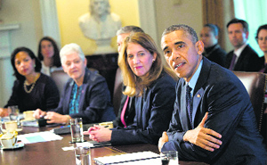 President Barack Obama with his cabinet members in the White House Cabinet Room.