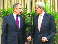 US Secretary of State John Kerry (R) and Russian Foreign Minister Sergei Lavrov chat before their meeting on the sidelines of the APEC meeting in Beijing on Saturday.