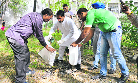 Research and Medical Education Minister Anil Joshi takes part in a cleanliness drive at Guru Nanak Dev Hospital in Amritsar on Sunday.