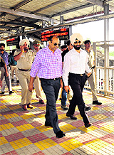 Deputy Commissioner Mohammed Shayin and UT SSP Sukhchain Singh Gill review security arrangements at the railway station in Chandigarh on Sunday. 