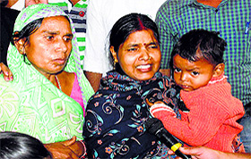 The wife and child of the missing contractor.