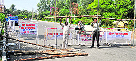 Barricades being installed at the entrance to the Chandigarh railway station. Tribune Photo: S Chandan