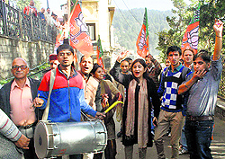BJP workers celebrate the induction of JP Nadda as Cabinet minister, in Shimla on Sunday