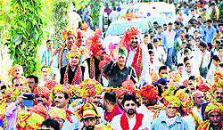 CM Virbhadra Singh leads a procession during the Sombhadra Mahotsav in Una on Sunday