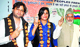 Jammu and Kashmir Peoples Front chief patron Satish Poonchi along with party candidates for upcoming Assembly elections in Jammu on Sunday. 