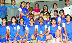 Winners of the Ludhiana Sahodaya School Complex (LSSC) Volleyball Tournament with the trophy in Ludhiana