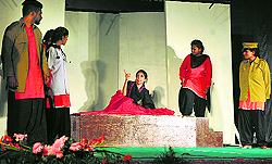 Participants stage a play