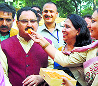 JP Nadda celebrates at his residence on Sunday