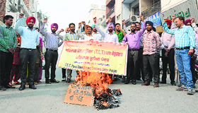 Members of the TET Pass Unemployed Teachers Union hold a protest in Sangrur on Sunday.