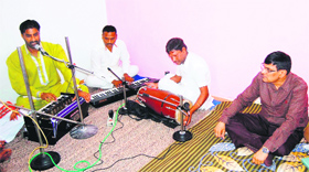 Punjab ADGP (Jails) RP Meena (extreme right) watches a musical performance after inaugurating a music room and skill development centre for inmates at Patiala Central Jail on Sunday.