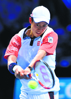 Japans Kei Nishikori stunned Andy Murray in straight sets in the opening match of the ATP Tour Finals.