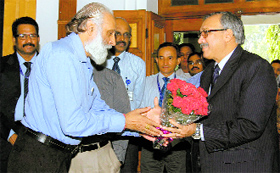 Parmod Sharma, general secretary, Associate Banks' Officers Association (L), greets VG Kannan, managing director, SBI associates and subsidiaries division, during his visit to Patiala on Monday for Swachh Bharat Campaign.