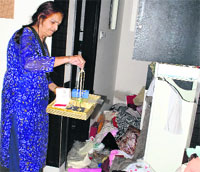 An occupant shows the ransacked house in Phase X, Mohali, on Monday. A Tribune photograph
