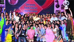 Students of CMK National PG College for Women, Sirsa, with the winners trophy at Chaudhary Devi Lal University in Sirsa on Monday. Tribune photo: Sanjeev Sharma