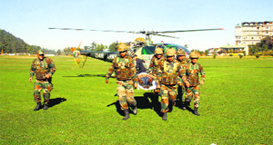 Army personnel during a mock drill at the Annandale Ground in Shimla on Monday.