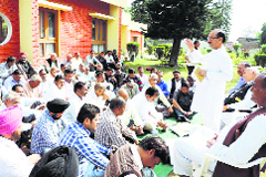 State BJP president Satpal Singh Satti addresses party workers in Una on Monday.