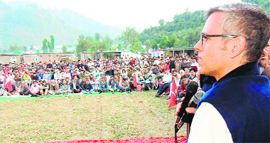 Chief Minister Omar Abdullah addresses a rally at Chanderkote in Ramban district on Monday.