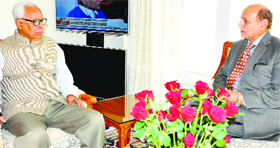 Governor NN Vohra with KB Jandial, Member, Jammu and Kashmir Public Service Commission, at Raj Bhawan in Jammu on Monday.