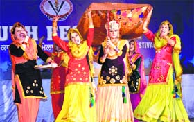 Girls perform giddha during the Inter-College Youth Festival at GADVASU in Ludhiana