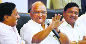 NCP president Sharad Pawar with party leaders Sunil Tatkare and RR Patil address a press conference in Mumbai on Monday.